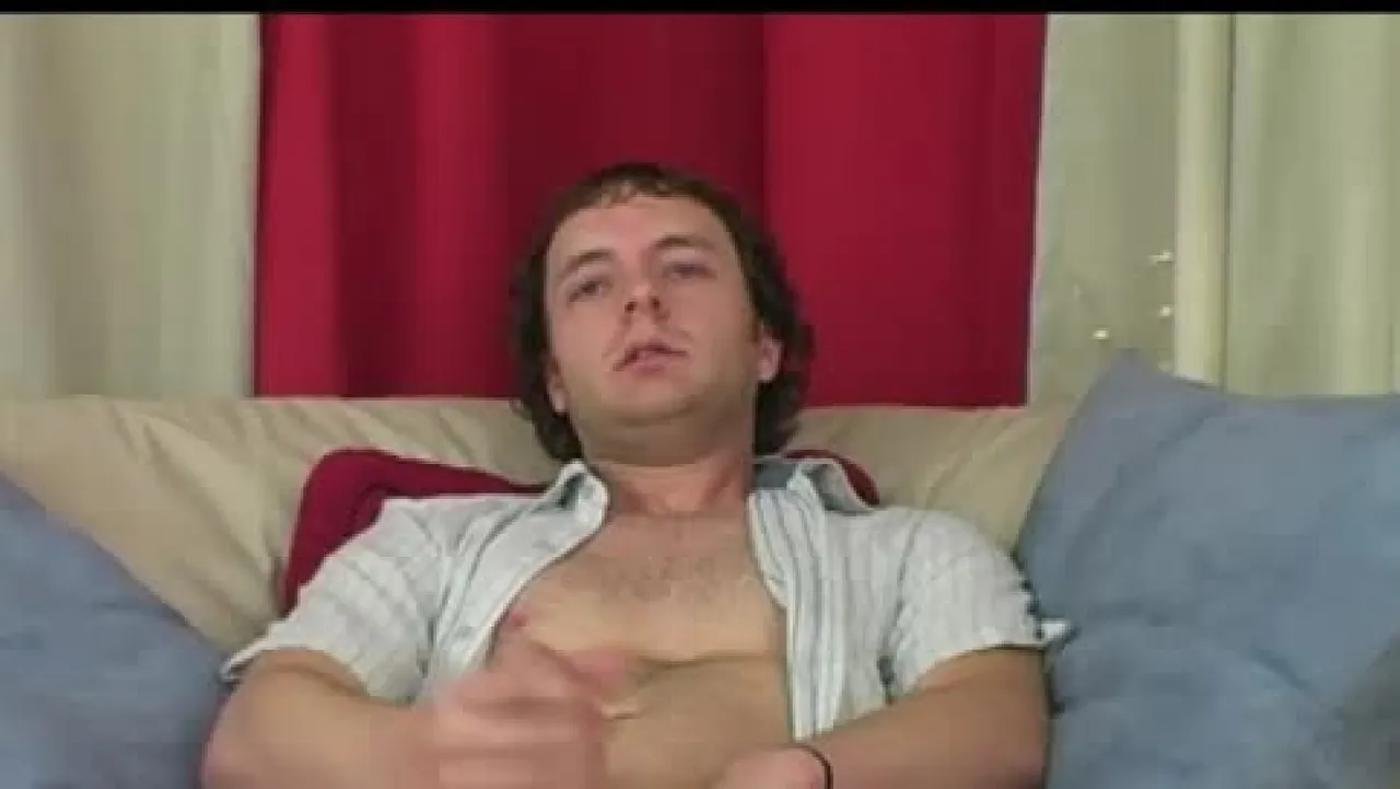 Club Stroke gay porn scene: Johnny Deep Jerks On the Couch